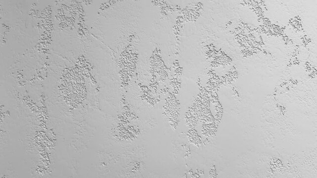 Neutral light gray plaster wall texture background with abstract organic uneven pattern