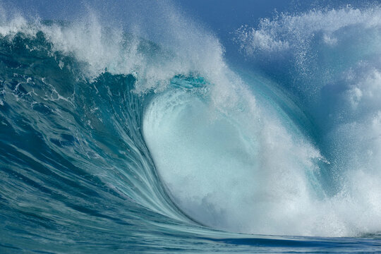 Powerful breaking wave with spray in Oahu Hawaii Pacific Ocean