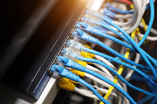 LAN internet network cable or RJ45 UTP fiber optic connect to network management equipment for cloud computing computer data link file transfer or wifi networking devices technology server system.