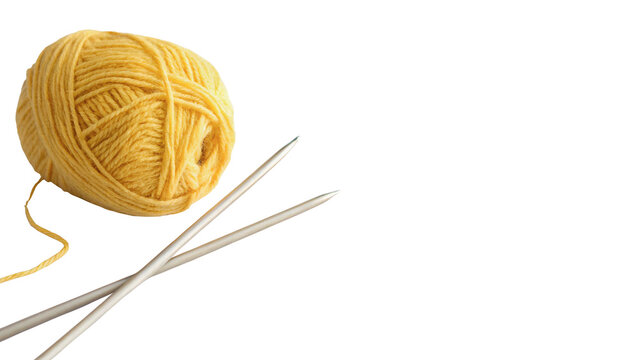 Knitting project with yellow yarn and silver needles isolated on transparent background cut out