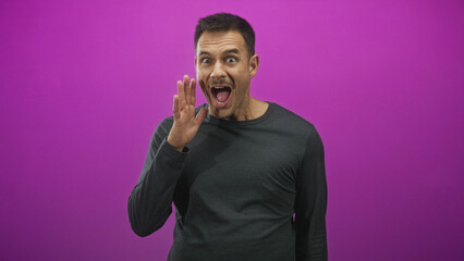 Obraz premium Man waving hand with open mouth and visible moustache in studio with purple backdrop, expressive gesture; excitement.