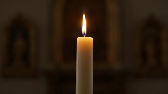 Burning candle in dark church interior symbolizing baptism light, Easter vigil, hope, purity, and the presence of Christ.