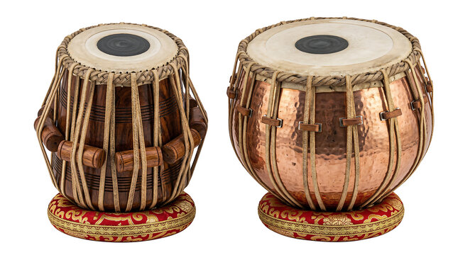 Traditional Indian Tabla drums, a pair of authentic Hindustani classical music percussion instruments, featuring a wooden dayan and copper bayan on decorative cushions, studio shot.