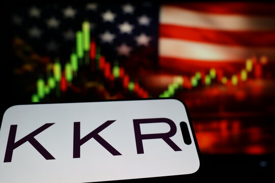 Kiel, Germany - 03-03-2026: US private equity firm KKR & Co. Inc. logo on smartphone against US flag and rising stock market candlestick chart concept