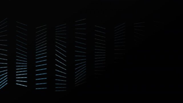 Vertical blue lines and dots weave mesh-like pattern on black