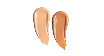 Obraz premium Two swatches of liquid foundation, one lighter, one darker, on white