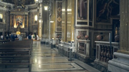 Blurred ornate church interior with shallow focus on marble aisle, gilded altar and vaulted nave  background backplate copyspace calm. © Krakenimages.com