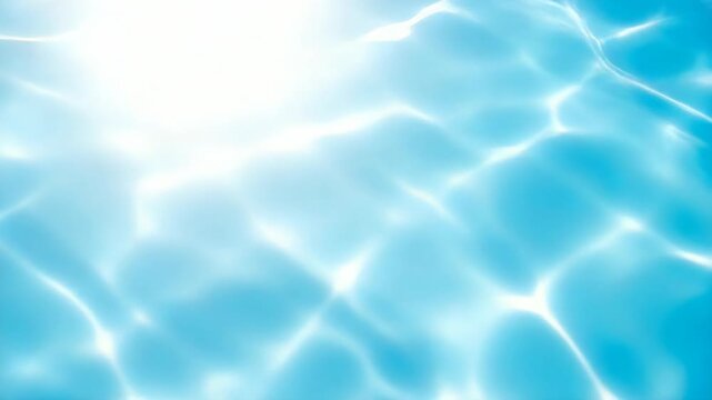 Bright sunlight reflecting on turquoise swimming pool water surface with shimmering caustic patterns