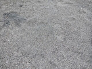 Obraz premium Sand on Pandansari Beach, Yogyakarta, Indonesia. Rough textured. Close up photo.