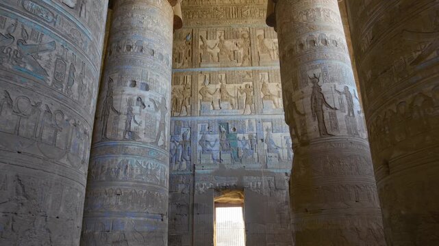 Dendera temple or Temple of Hathor. Painted columns with goddess faces and hieroglyphic ceiling of the hypostyle hall. Downscaled from 6k.