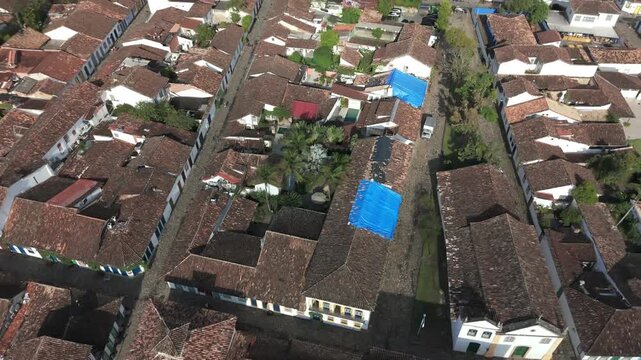 Old Town With Tiled Roofscape In Paraty, Brazil. Aerial Pullback Rotate Shot