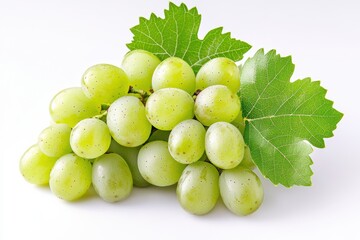 Fresh green grapes on display with leaves arranged around them in a neat cluster