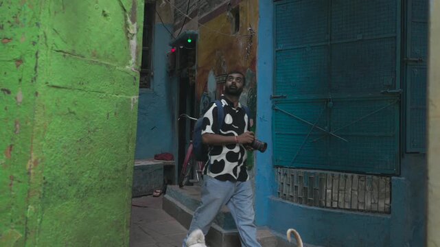4K Travel Vlogger Filming Streets of Varanasi India in Slow Motion