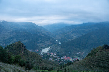 Fototapeta premium Foggy hills covered with forest