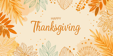 Autumn leaves and a happy thanksgiving greeting on a soft background © Sourav