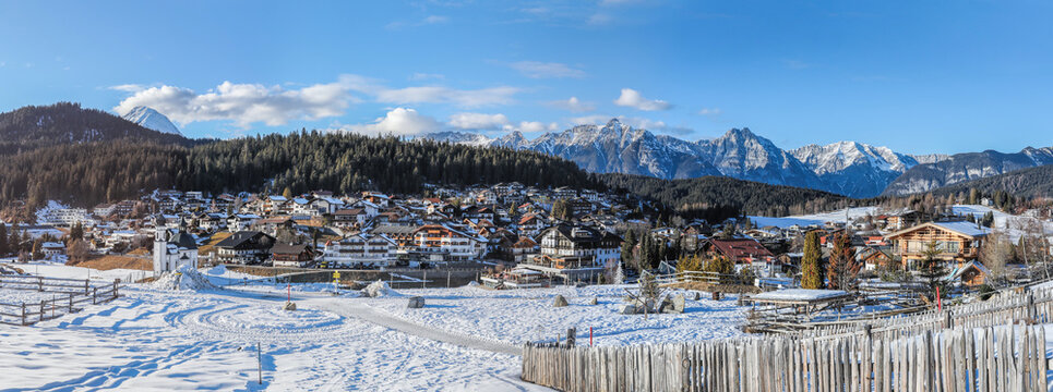 Winter panorama of Seefeld village with the church at sunset in in the Tyrolean Alps, Austria