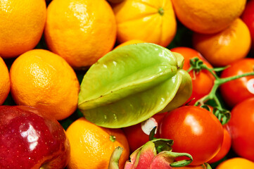 Fresh vibrant a mix of exotic fruits and vegetables