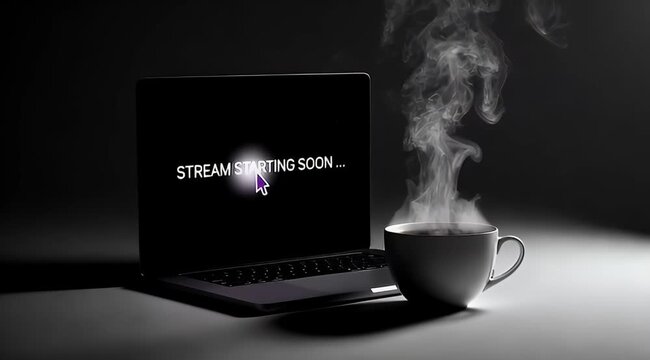 Stream starting soon displayed on laptop with cup of hot coffee