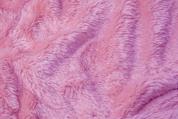 Detailed view of soft luxurious gentle pink plush fleece fabric texture background material © reddish