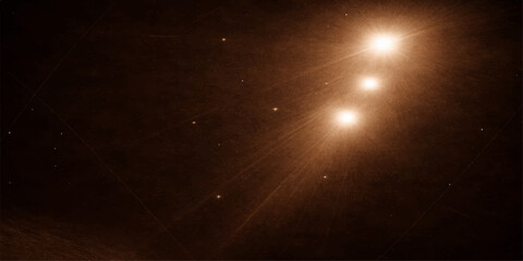 Sun and stars glowing in a dark blue space sky background with bright light rays © Rupa