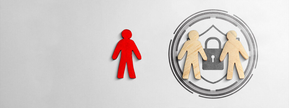 A red human figure stands excluded from a protective circle containing two wooden figures, a shield, and a padlock icon. Symbolic of cybersecurity, data privacy, and group protection