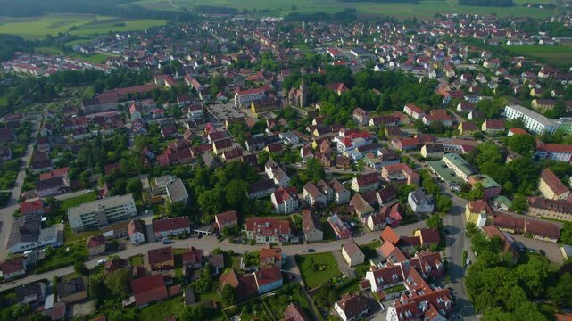 Aerial panorama view of the city Neuendettelsau in Germany, Bavaria on a sunny day in Spring