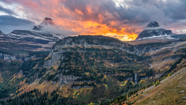 Dramatic sunset on the Going to the Sun Road in fall - Mount Oberlin - Glacier National Park	