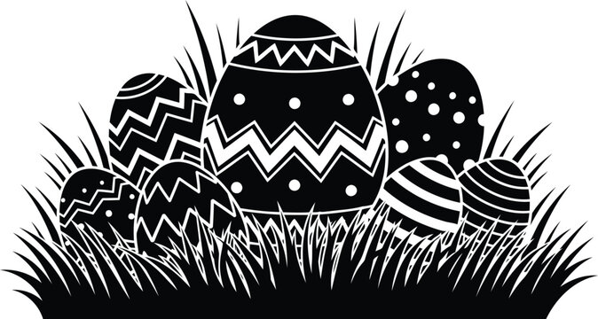 Black and white Easter eggs in grass