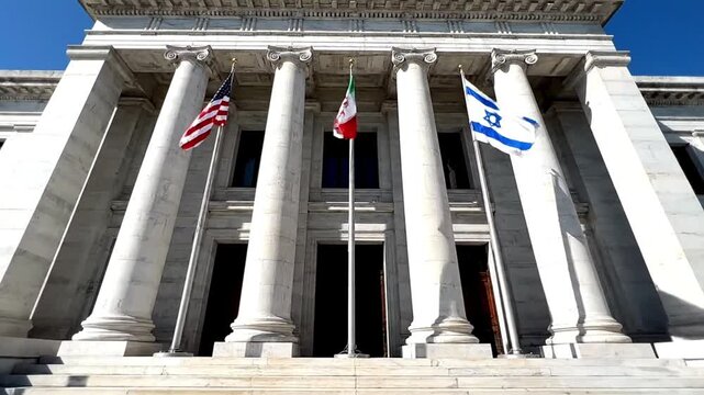 Grand Government Building Showcasing Flag‑Adorned Columns in Washington&rsquo;s Bright Blue Sky