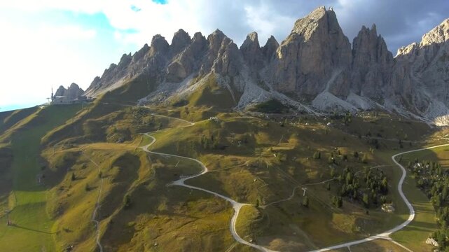 Aerial drone view flying green wild forest in morning after sunrise highland swiss mountain scenary motion nature travel destination