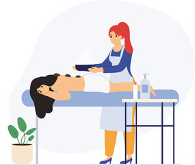 Fototapeta premium Woman enjoying hot stone therapy spa treatment