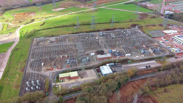 Aerial view of Hams Hall National Grid substation with high voltage pylons and busbars.