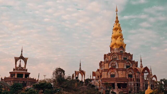 Wat phra that pha son kaew temple sits atop a mountain in thailand