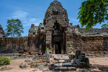 Fototapeta premium Ancient stone temple entrance in Preah Ko at Roluos near Siem Reap