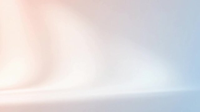 Abstract Color Wash A soft focus, abstract presentation of a pastel backdrop, where a side light creates a smooth wash of color and gentle, ethereal blurs, slowly transitioning in intensity.