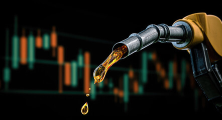 energy shortage crisis picture of gasoline petroleum fuel nozzle with blurred background of oil price graph of the energy business market.