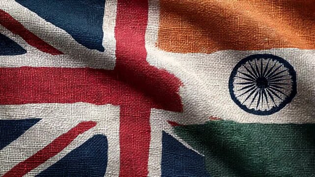 british flag waving next to indian flag. relations between great britain and india