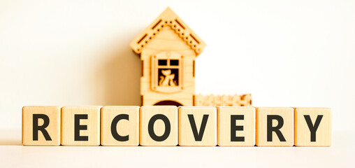 Recovery word symbol. Concept word Recovery on beautiful wooden blocks. Beautiful white background....