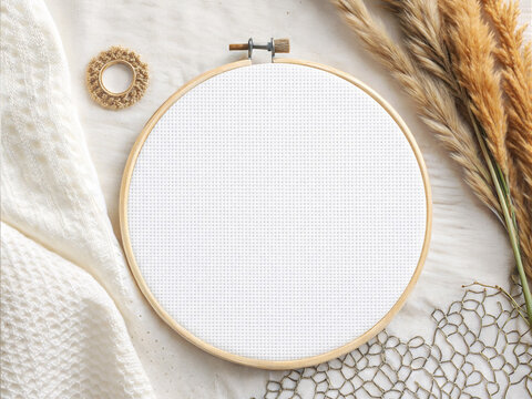 Embroidery hoop mockup with blank fabric and dried grass