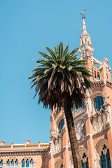 Sant Pau Hospital and palm tree in Barcelona, Spain