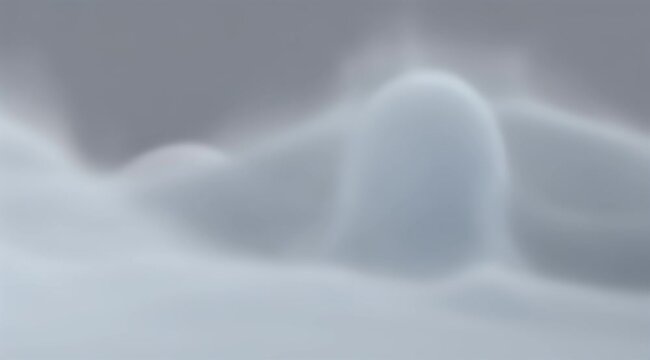 Soft, out-of-focus abstract shapes in shades of gray and white
