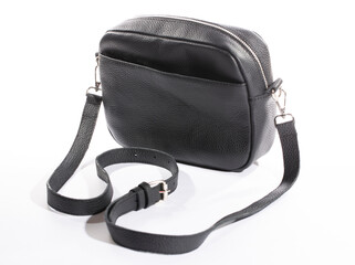 Black women's leather bag on a white background