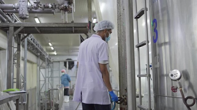 Quality control procedures in a food processing facility manufacturing plant image series industrial environment focus on worker actions