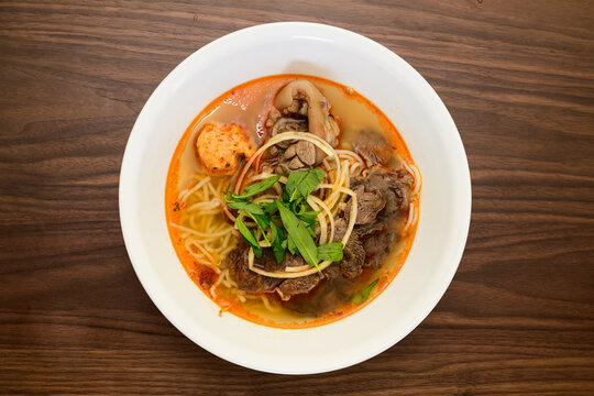 Bun Bo Hue Vietnamese Beef noodle soup. Top view