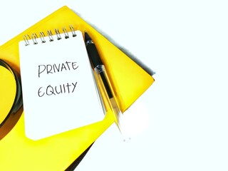 Private equity text on notebook with pen