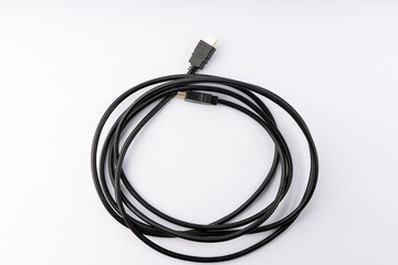 Coiled Black HDMI Cable for High-Definition Connectivity