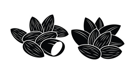 Two arrangements of almonds and a cracked nut are presented in a striking black and white silhouette © jivect02