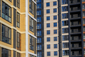 Fototapeta premium Modern residential buildings with varied architectural designs and colors