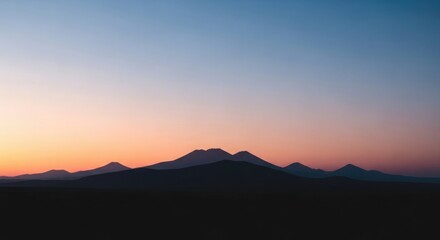 Fototapeta premium Serene mountain landscape at sunset with vibrant colorful sky