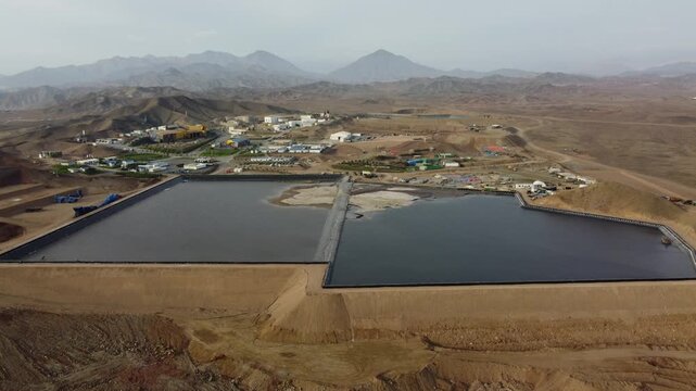Aerial view of tailing ponds in a mining camp
